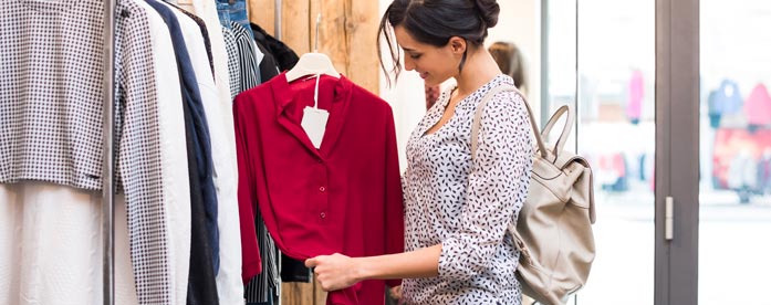 woman looking at clothes