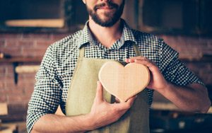 Guy with wooden carved heart