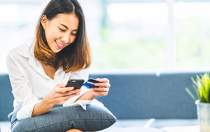 woman shopping on smartphone