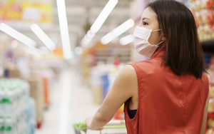 woman shopping wearing mask