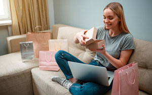 woman opening boxes