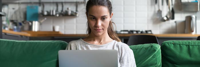 woman surfing on laptop