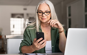 woman getting message on a smartphone