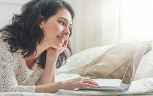 woman shopping on laptop