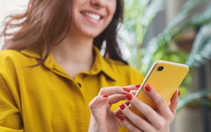 woman using iphone