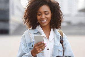 woman getting a text on her phone