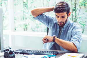 employee looking at watch