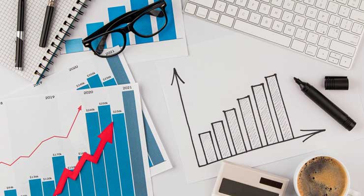 business desk with graph charts