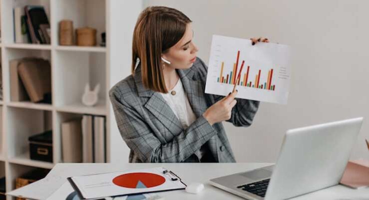 woman showing forecast graph